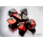 CHX20633 Black and Red Gemini Mini Dice with Gold Colored Numbers 10mm (3/8in) Set of 7