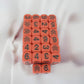 KOP18277E50 Skull and Cross Bones Dice Red Black Large Numbers D6 15.8mm Pack of 50
