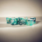 MET634 Teal and Black Eternal Resin Dice with White Numbers 16mm (5/8in) 7 Dice Set