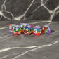 MET677 Translucent Rainbow Dice with White Numbers Acrylic 7 Dice Set