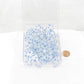 WCXPB2081E50 Icicle Borealis Dice Luminary Light Blue Numbers D20 Aprox 16mm (5/8in) Pack of 50 Main Image