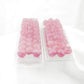 WCXPB2084E50 Pink Borealis Dice Luminary Silver Numbers D20 Aprox 16mm (5/8in) Pack of 50 Main Image