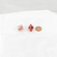 WCXPN0854E2 Red Nebula Luminary Dice Silver Numbers 16mm (5/8in) D8 Set of 2 Main Image